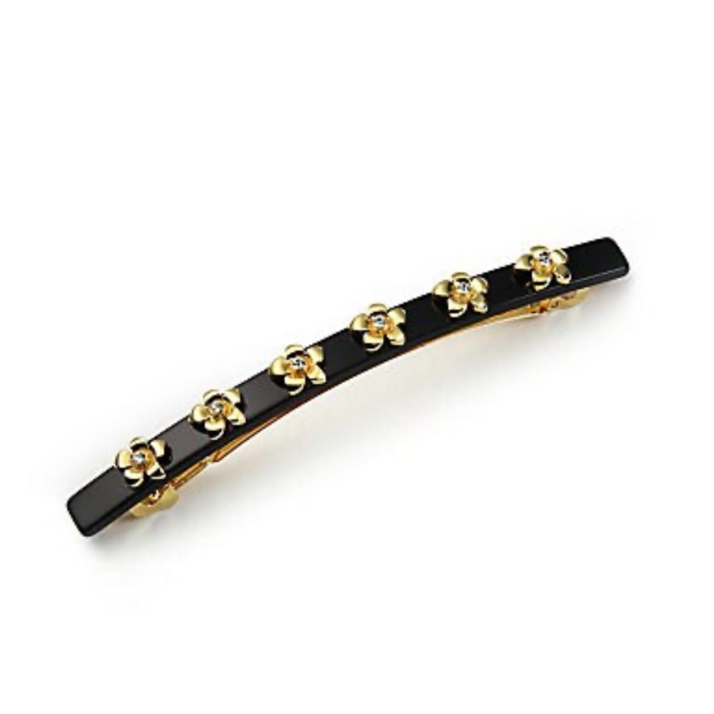 L. Erickson
Flower-Studded Skinny Barrette
